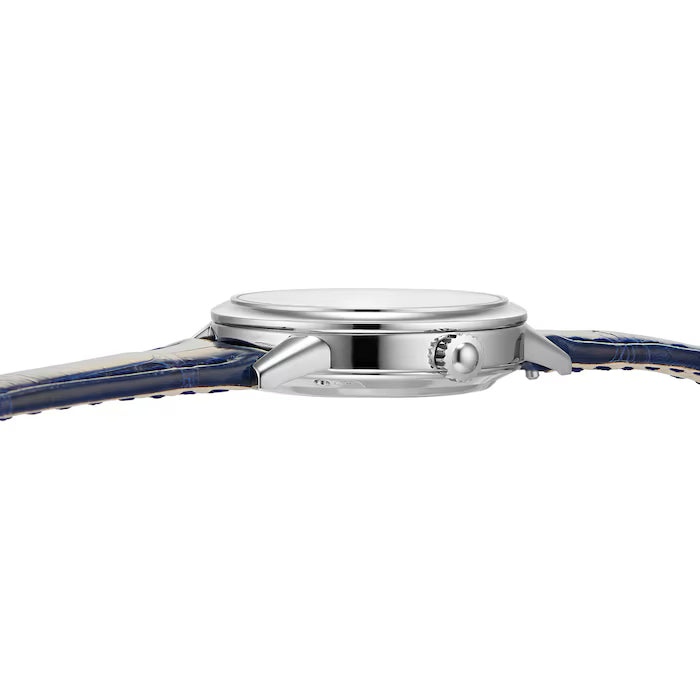 A side view of the Jaeger-LeCoultre Rendez-Vous Night & Day women's watch highlights its thin silver case, prominent crown, and dark blue leather strap with visible stitching, reflecting the refined elegance of the luxury collection.