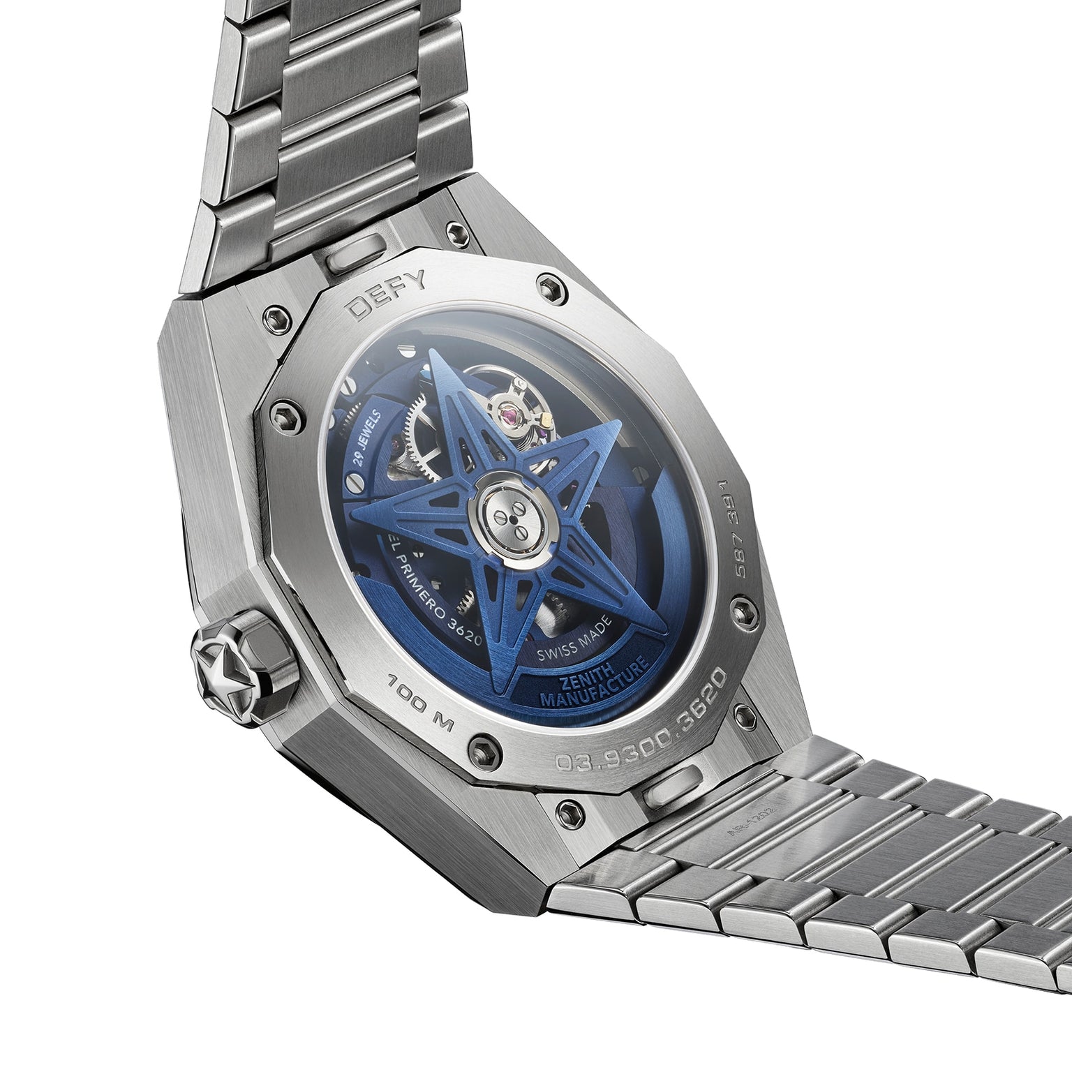 The image shows the back of a Zenith Defy Skyline Skeleton watch, featuring a blue star-shaped rotor, showcasing the El Primero movement and a stainless steel bracelet for urban sophistication.