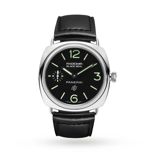 The Panerai Radiomir Seal Logo Acciaio es men’s watch features automatic movement, a black leather strap, black dial with luminous green markers and hands, plus a small seconds sub-dial at 9 o’clock, shown on a white background.