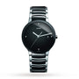 The Rado Centrix Diamonds men’s watch features a black dial, stainless steel band with high-tech ceramic accents, silver hands, four diamond hour markers, and a date window at 3 o’clock.