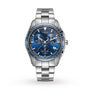 The Rado Hyperchrome Chronograph features a silver stainless steel case, blue dial with three subdials, date display at 4 o’clock, and the iconic Rado logo—showcasing the brand’s innovative spirit.