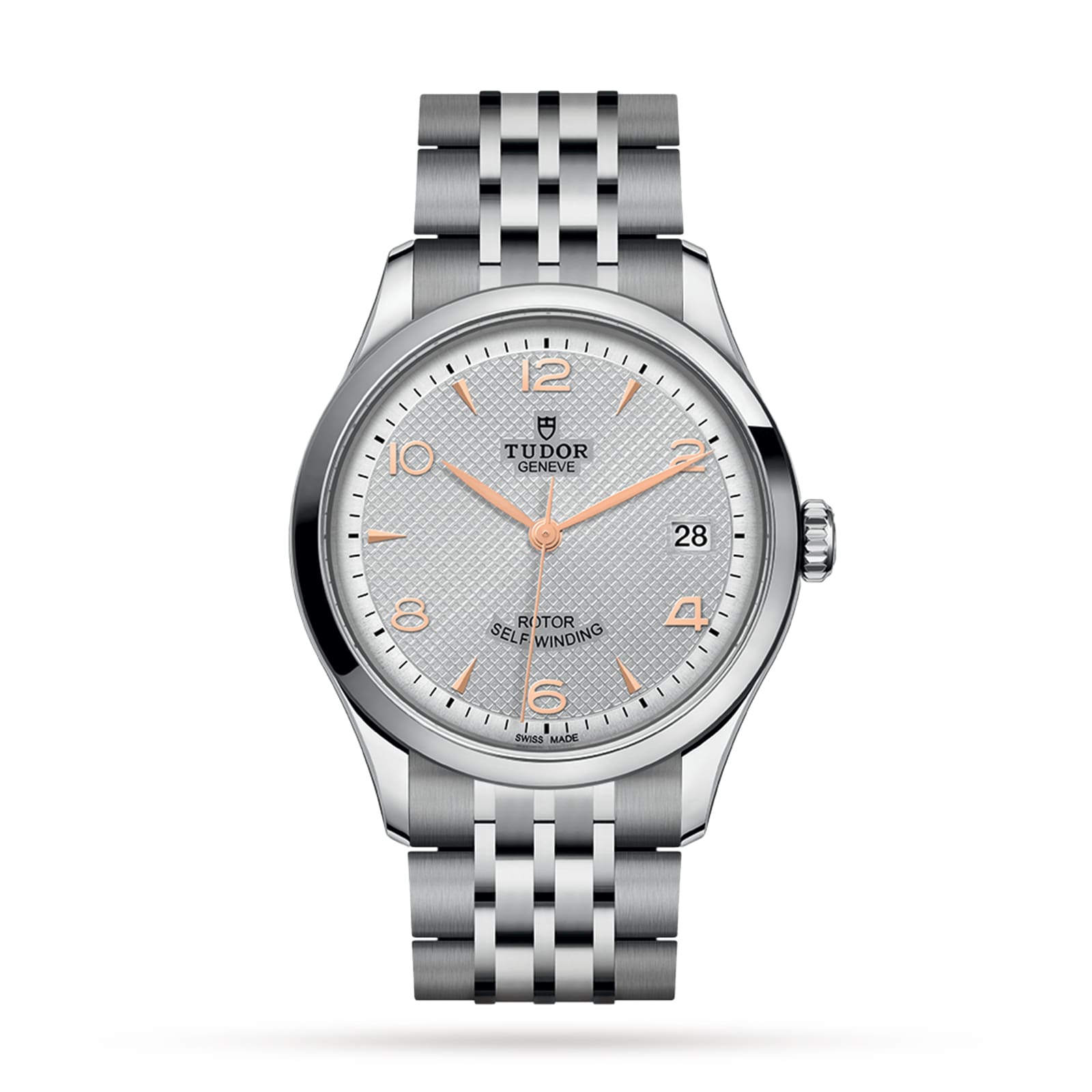 The TUDOR 1926 is a silver wristwatch featuring a textured white dial, gold hour markers, and a date window at 3 o’clock.