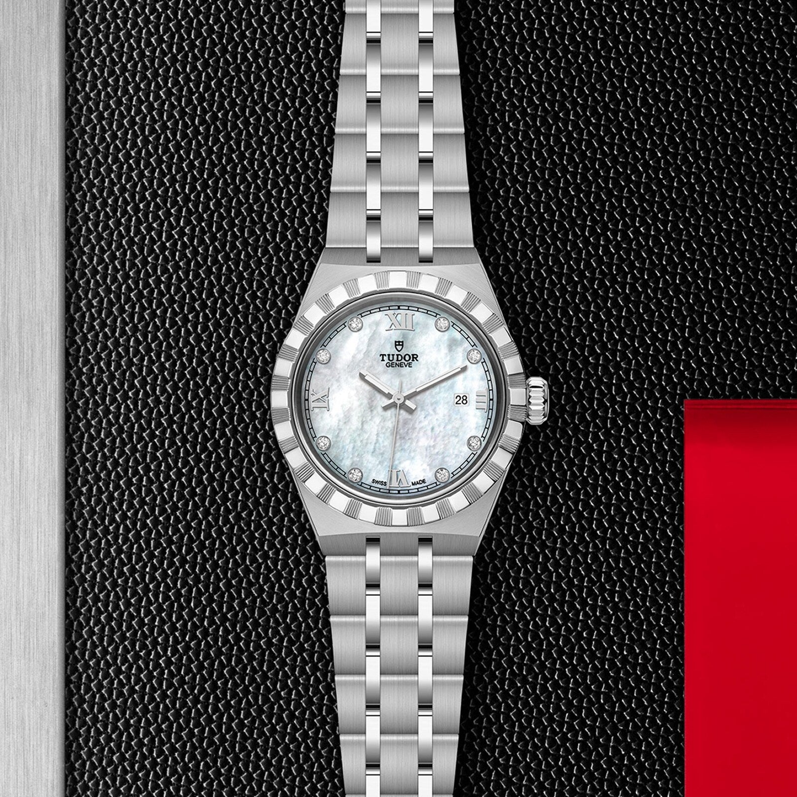 A TUDOR Royal wristwatch, featuring a silver case, white mother-of-pearl dial with diamond hour markers, and date display—an elegant automatic sport-chic timepiece by TUDOR.
