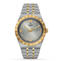The TUDOR Royal is a two-tone automatic watch with an integrated bracelet, gold bezel, silver dial accented by Roman numerals and diamond hour markers, plus date display—a sport-chic timepiece combining luxury and versatility.