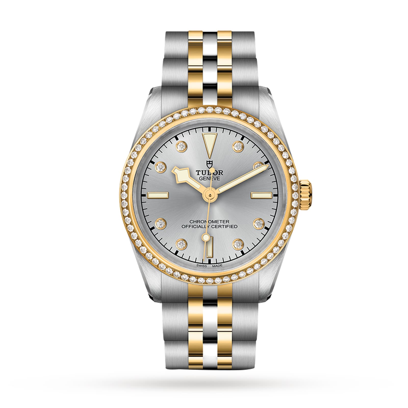 A TUDOR Black Bay One 31 S&G wristwatch with a silver dial, yellow gold markers, diamond bezel, and a stainless steel and gold bracelet is displayed on a white background.