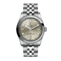 A TUDOR Black Bay One 31 wristwatch with a silver case, light beige dial, and metal link bracelet.