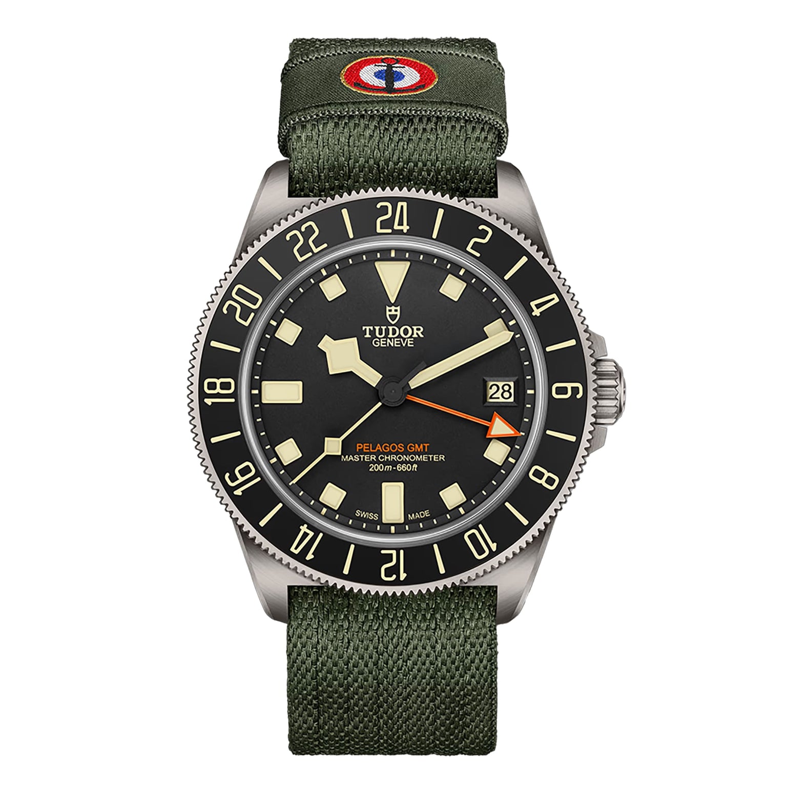 The TUDOR Pelagos FXD GMT watch features a green fabric strap, black bezel, and displays both date and time.