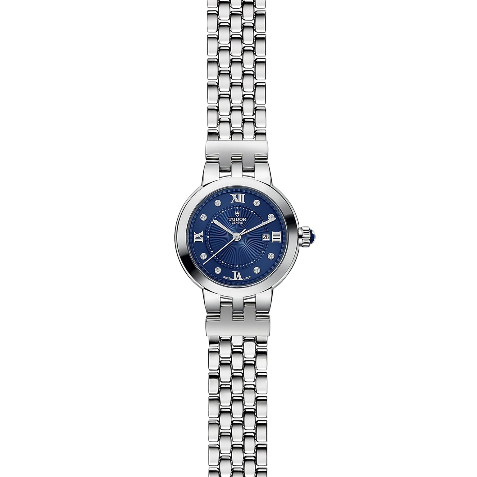 The TUDOR Clair de Rose wristwatch features a blue dial with Roman numerals and a silver metal link band, shown on a white background.