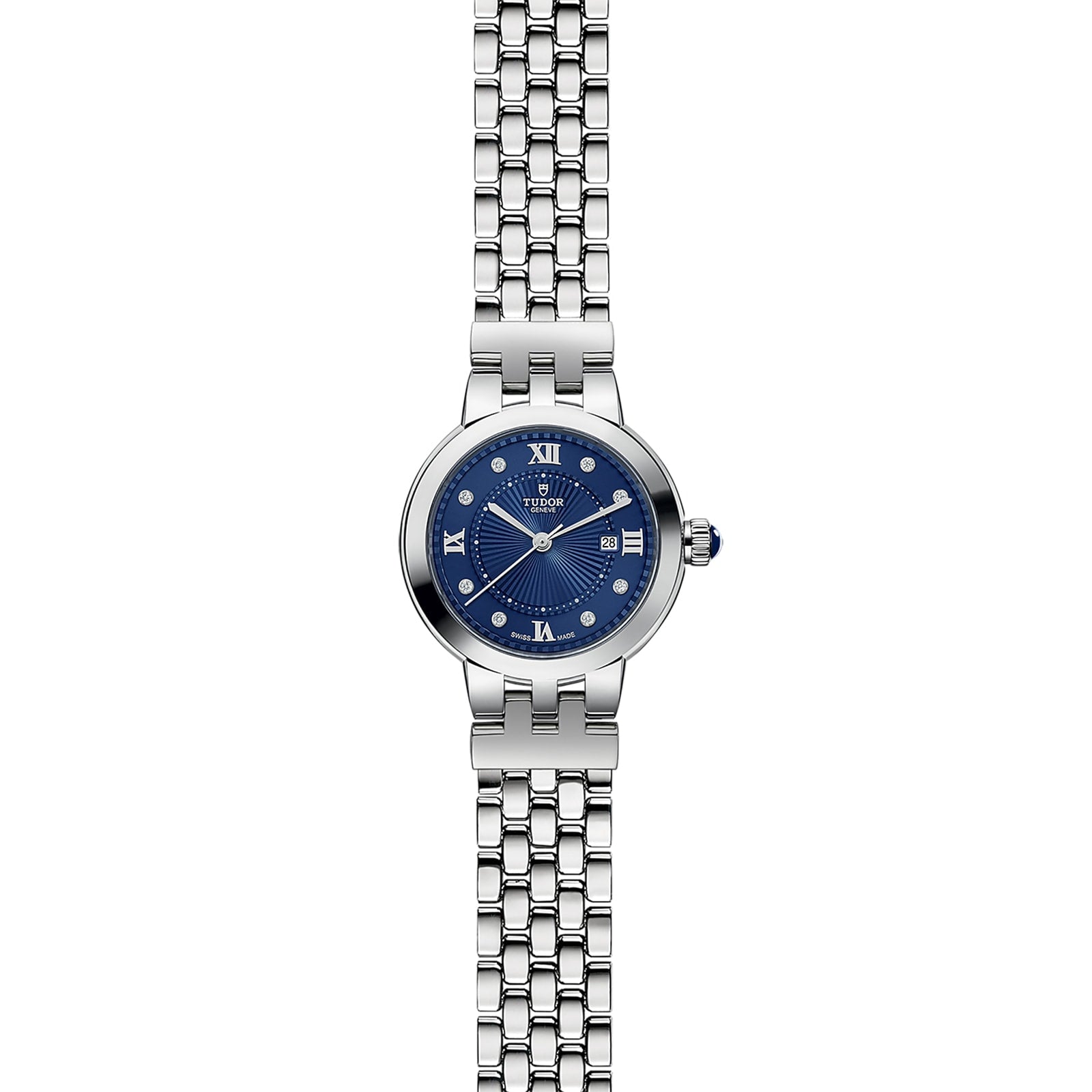 The TUDOR Clair de Rose wristwatch features a blue dial with Roman numerals and a silver metal link band, shown on a white background.