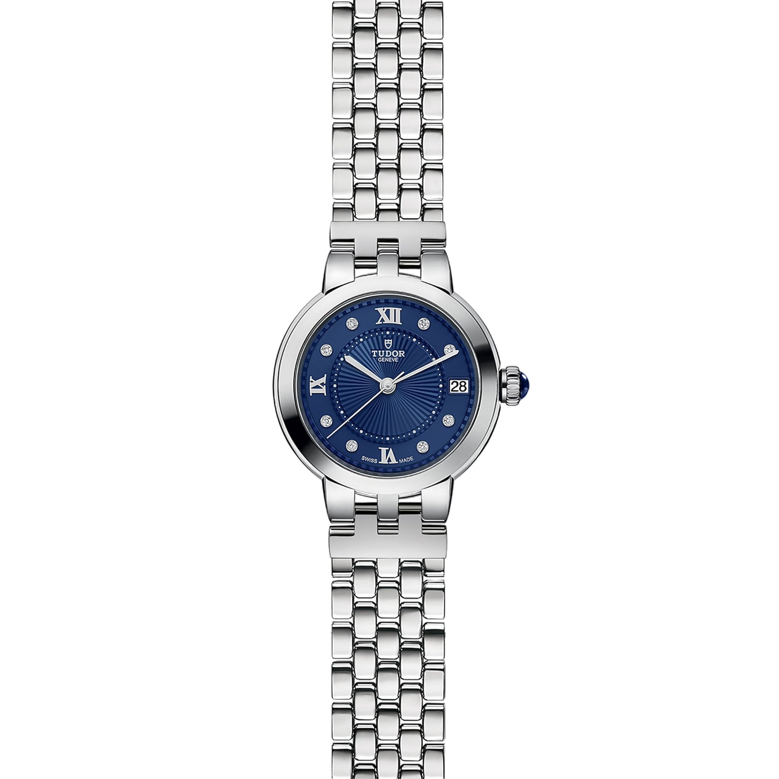 The TUDOR Clair de Rose is a silver wristwatch featuring a blue face with Roman numerals and a metal link band.