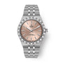 Stainless steel watch with rose-gold dial, textured bezel, applied indices, and three-link bracelet.