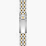 Two-tone stainless steel and gold watch bracelet with shield logo clasp.