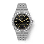 Steel watch with black dial, gold-tone hands and hour markers, day-date window, textured bezel, and integrated bracelet.