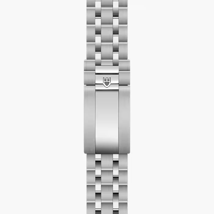 Stainless steel watch bracelet with polished and brushed links, featuring a Tudor shield clasp in the center.