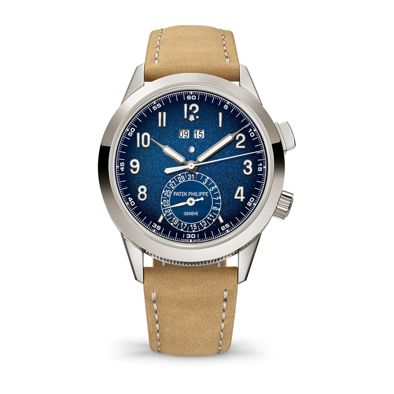 Watch with blue dial and beige leather strap on a white background