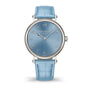 Watch with blue strap and blue dial on a white background