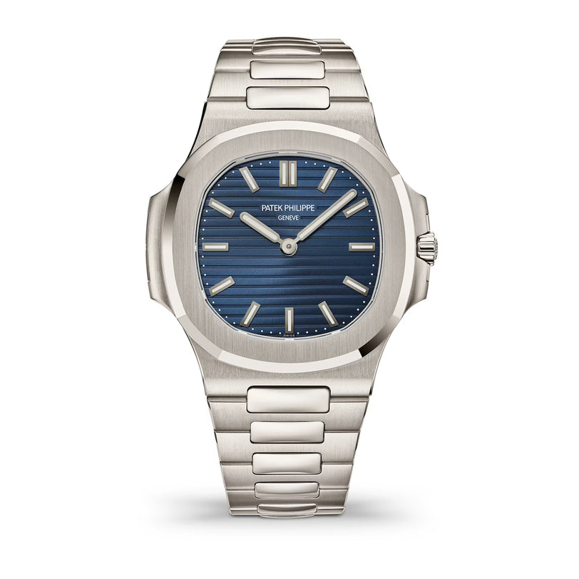 Silver Patek Philippe watch with blue dial on a white background