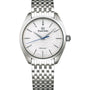 The Grand Seiko Spring Drive Manual Elegance features a textured white dial, blue second hand, and metal bracelet, inspired by Lake Suwa, displaying the time as 7:08:38.