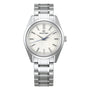 The Grand Seiko Manual Heritage features a stainless steel case, silver textured dial, silver hour markers, blue second hand, and a metal bracelet—showcasing the iconic 44GS Grand Seiko Style.
