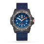 The Luminox Tide Eco Sustainable Outdoor wristwatch features a blue dial, fabric strap, black bezel, and white and orange accents.