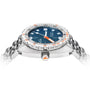 The DOXA Sub 1500T Caribbean is a stainless steel divers watch with a blue face, orange accents, and a metal bracelet, displayed from the side on a white background.