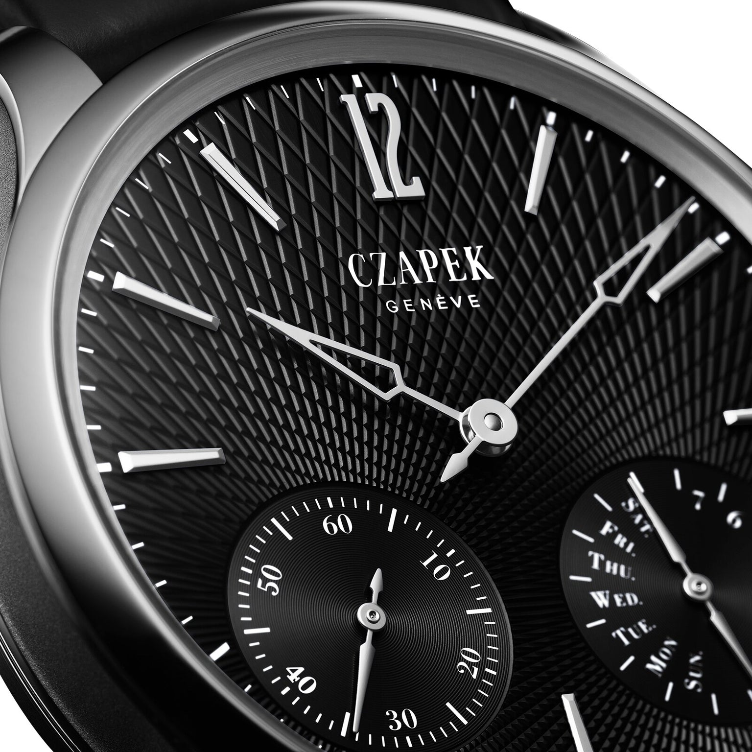 Close-up of the Czapek Quai des Bergues N°17 Double Soleil Tuxedo Black luxury watch, featuring a textured black dial and silver hour markers.