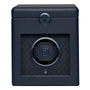 Dark blue leather watch winder with single circular watch holder, textured front panel, and power button at bottom.