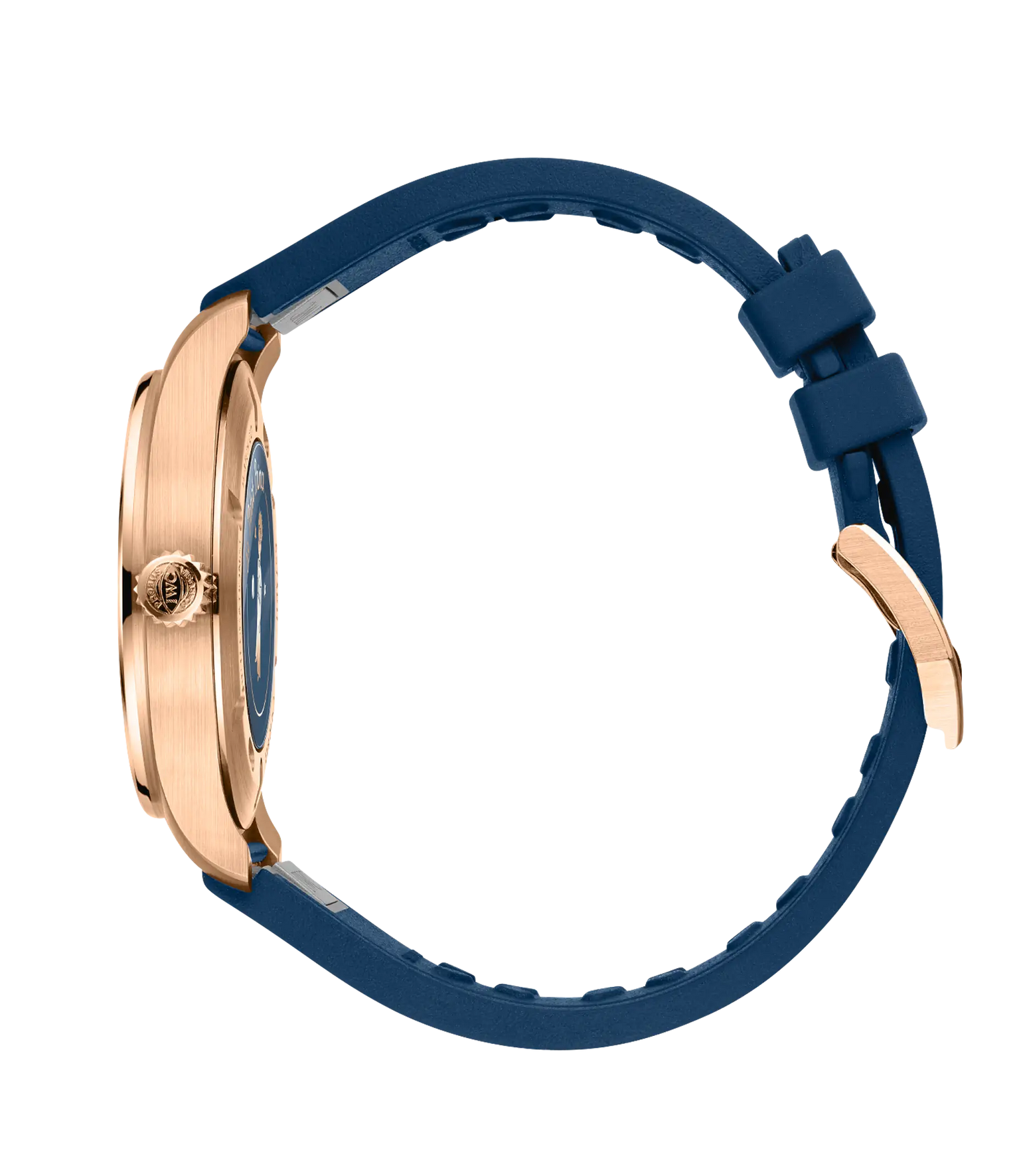Rose gold pilot's watch with blue dial and navy blue rubber strap, shown from the side.