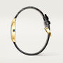 Black leather bangle bracelet with gold-tone metal cuff and buckle closure.