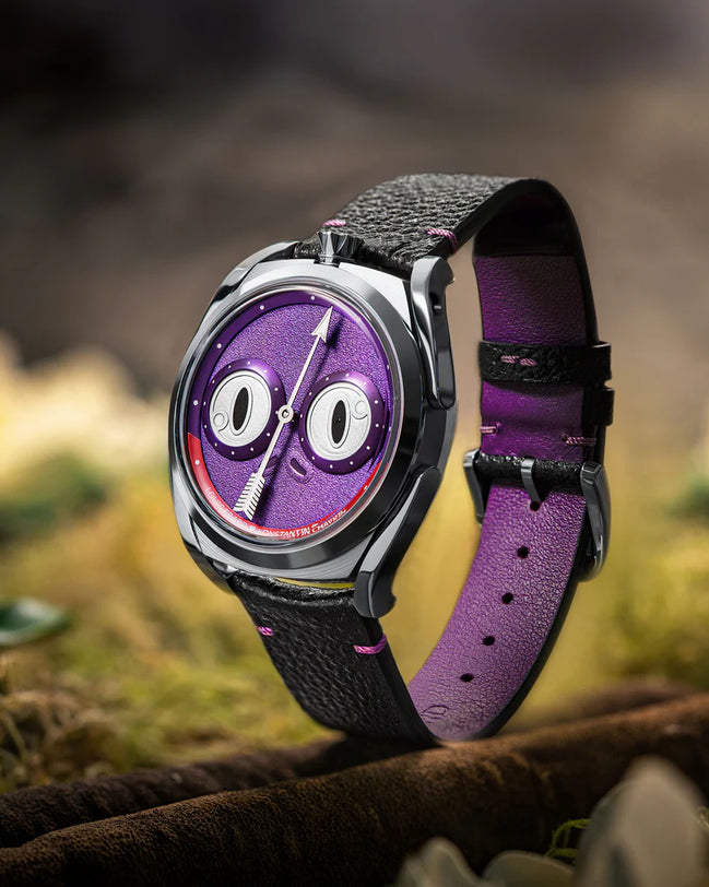 Watch with a purple strap and unique face design on a natural background