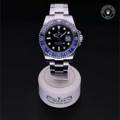 Rolex Certified Pre-owned GMT M116710BLNR-0002 front on black background