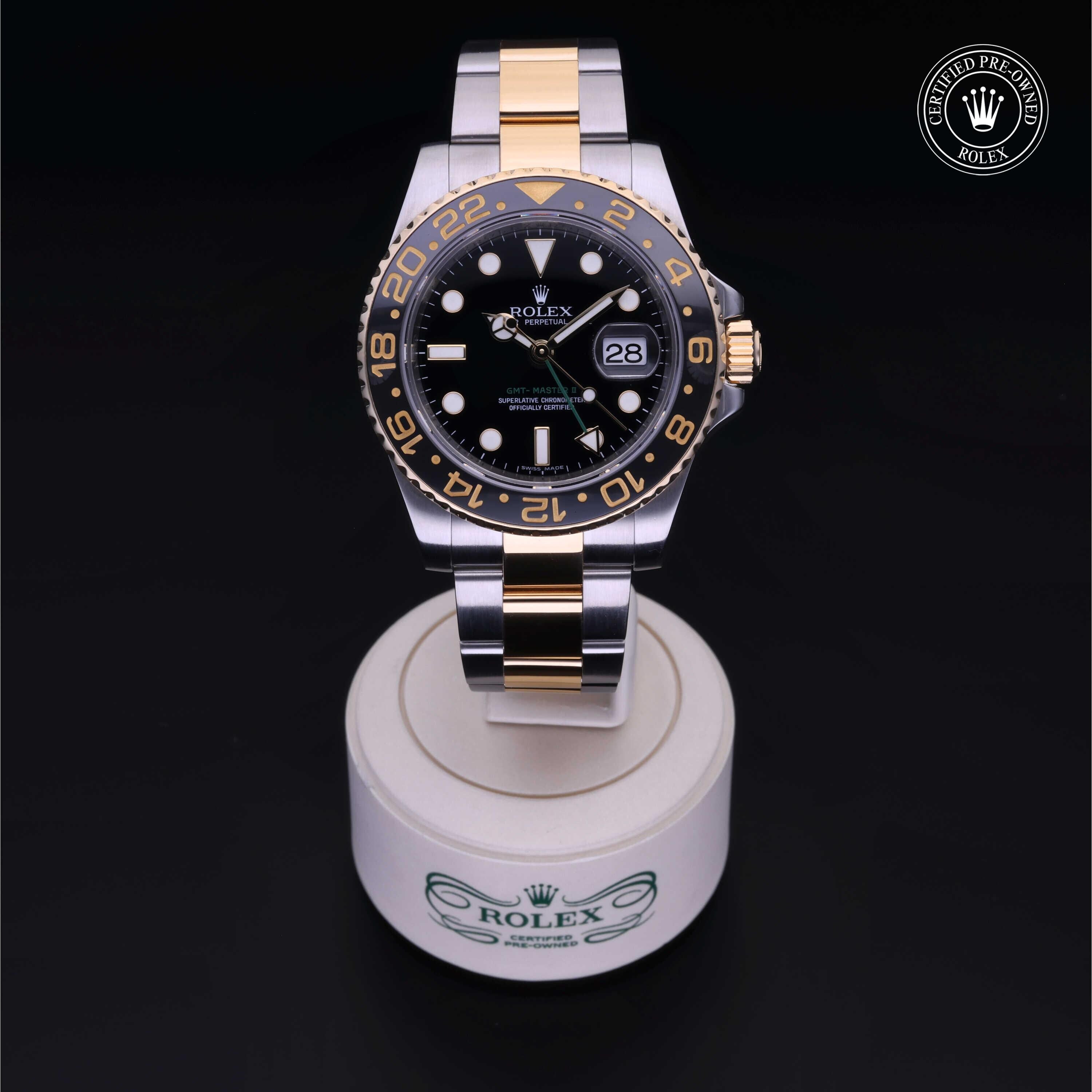Rolex Certified Pre-owned GMT M116713LN-0001 front on black background