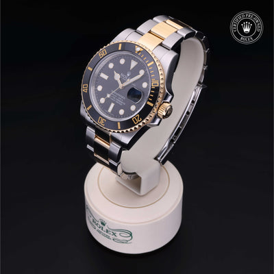 Rolex Certified Pre-owned Submariner Date M116613LN-0001 front on black background