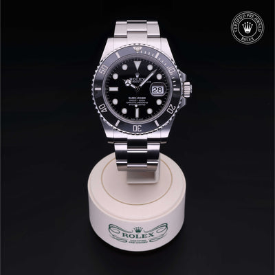 Rolex Certified Pre-owned Submariner Date M126610LN-0001 front on black background