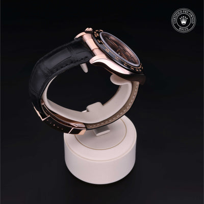 Rolex Certified Pre-owned Daytona M116515LN-0004 front on black background