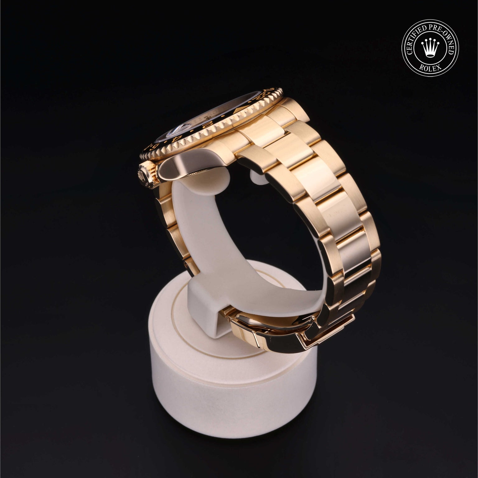 Rolex Certified Pre-owned GMT II M116718LN-0002 front on black background