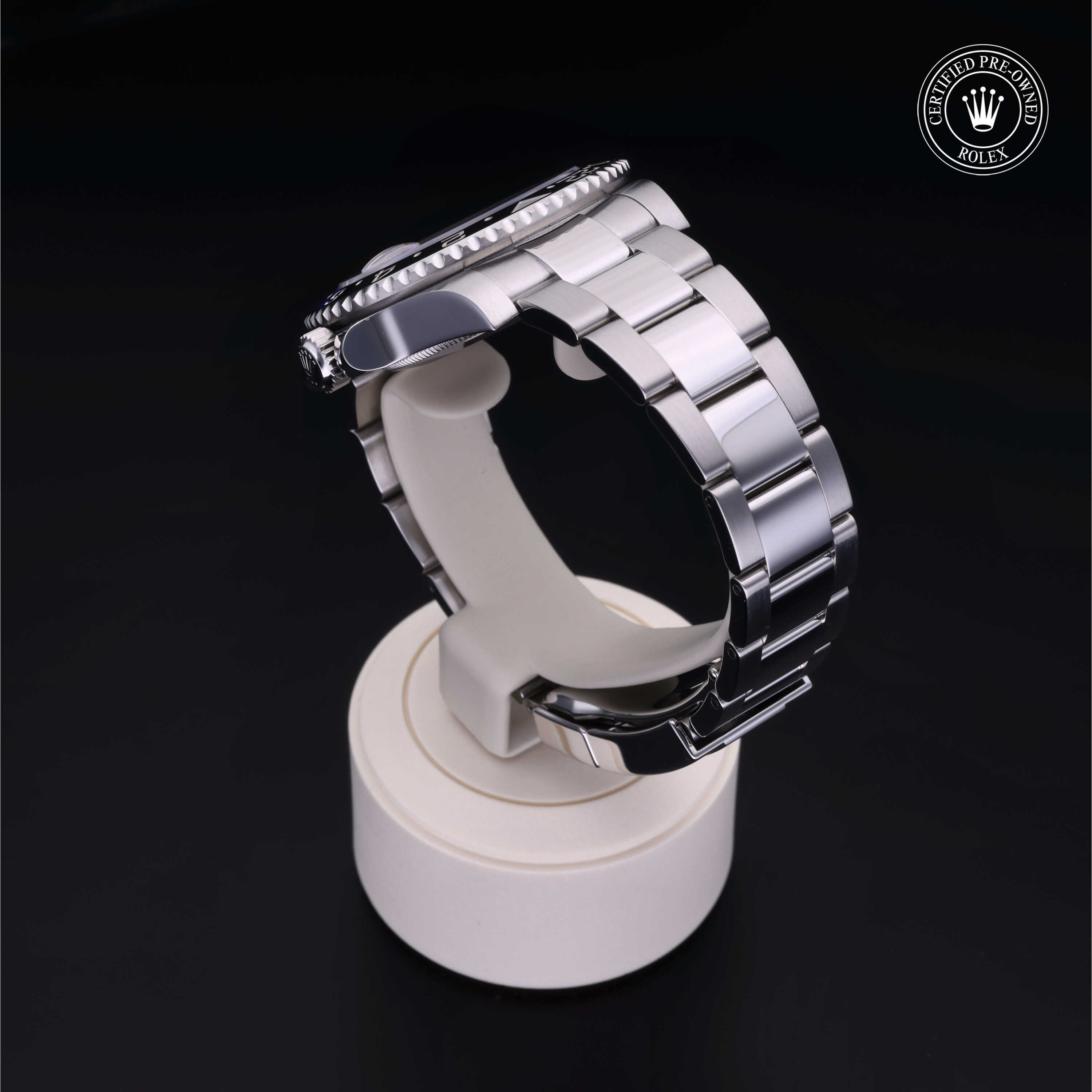 Rolex Certified Pre-owned GMT M116710BLNR-0002 front on black background