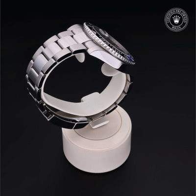 Rolex Certified Pre-owned GMT M116710BLNR-0002 front on black background