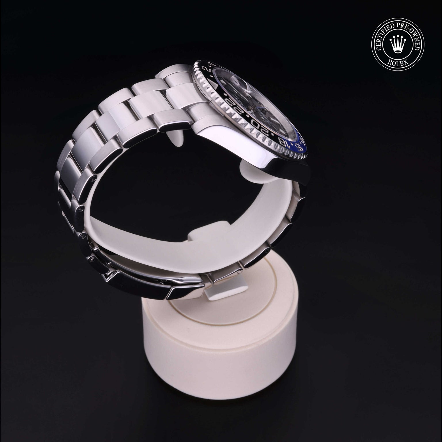 Rolex Certified Pre-owned GMT M116710BLNR-0002 front on black background