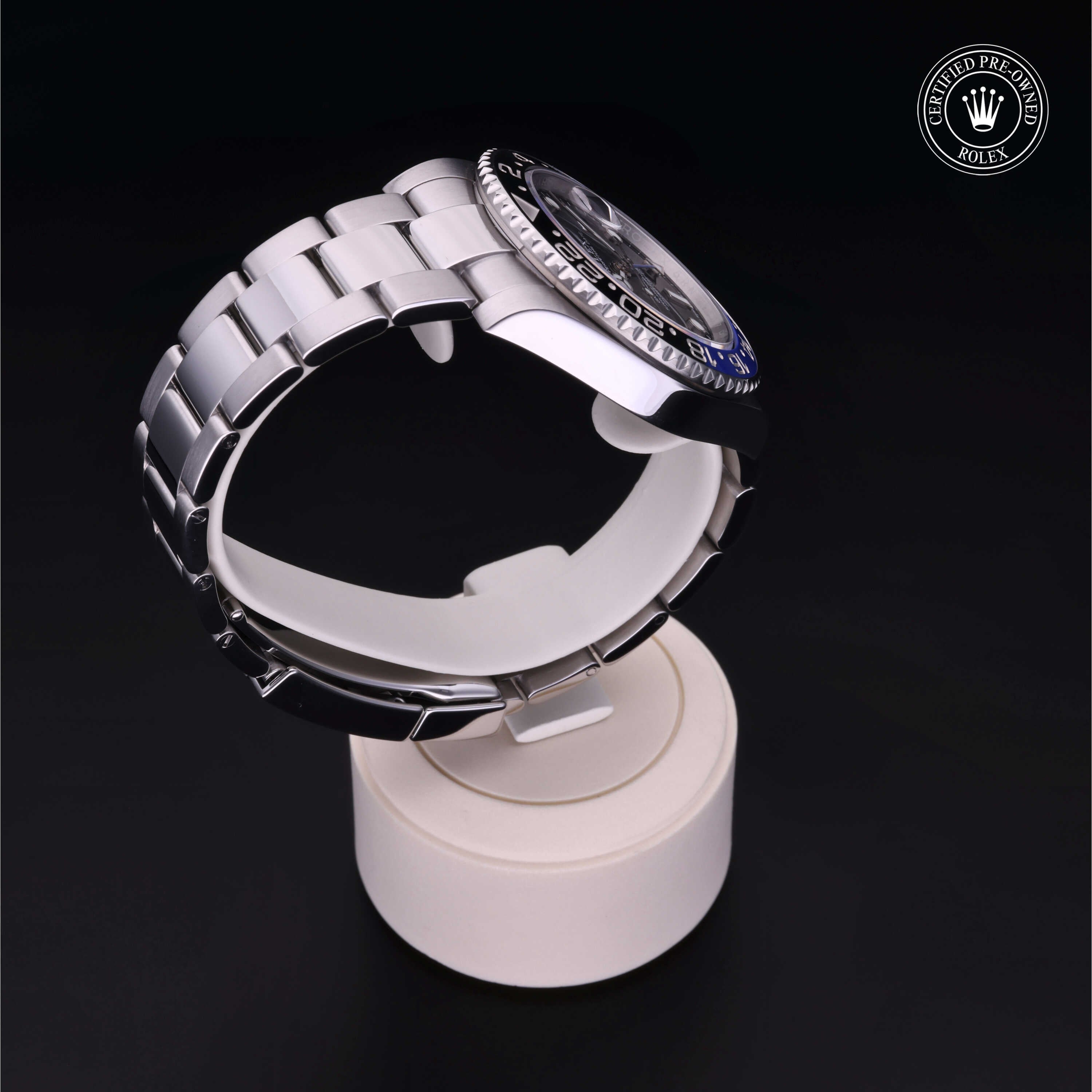 Rolex Certified Pre-owned GMT M116710BLNR-0002 front on black background