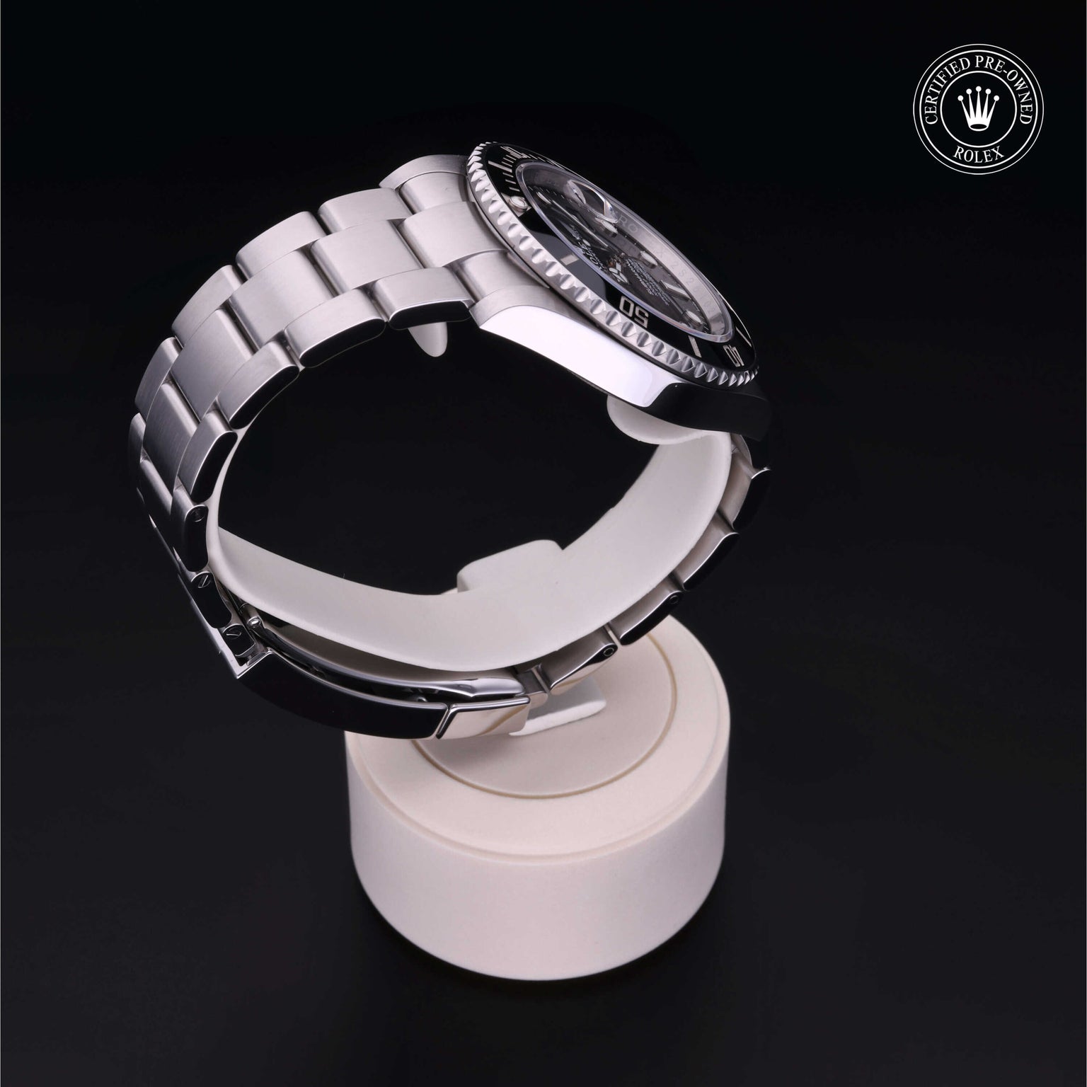 Rolex Certified Pre-owned Submariner M126610LN-0001 front on black background