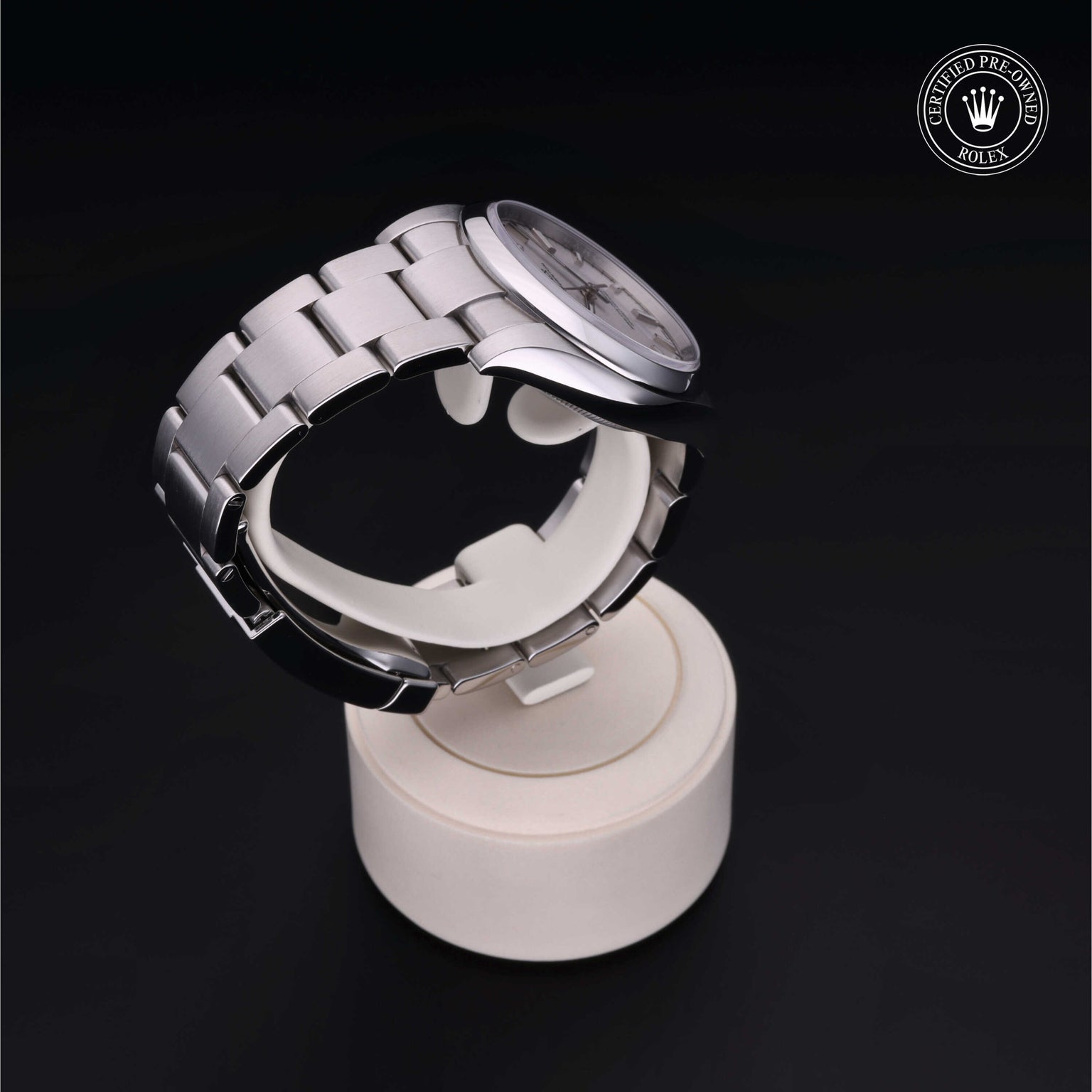 Rolex Certified Pre-owned Oyster Perpetual M114200-0024 front on black background