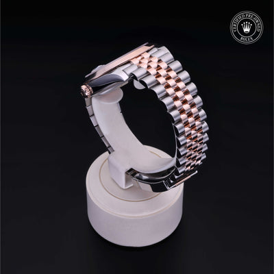 Rolex Certified Pre-owned Datejust M126301-0016 front on black background