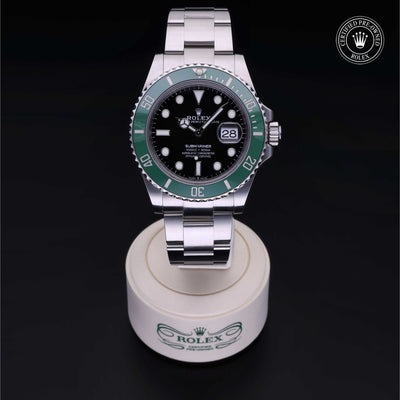 Rolex Certified Pre-owned Submariner M126610LV-0002 front on black background
