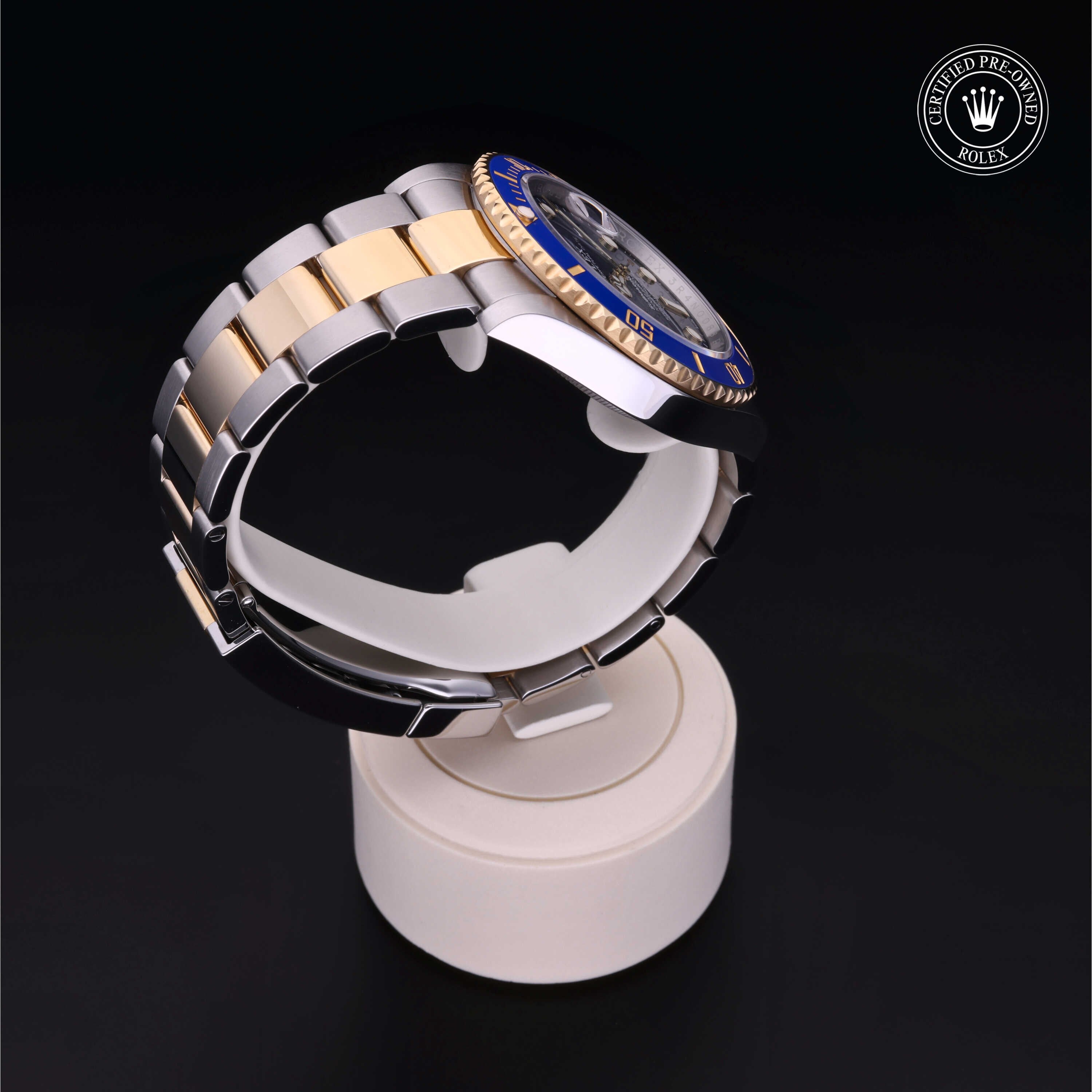 Rolex Certified Pre-owned Submariner M126613LB-0002 front on black background