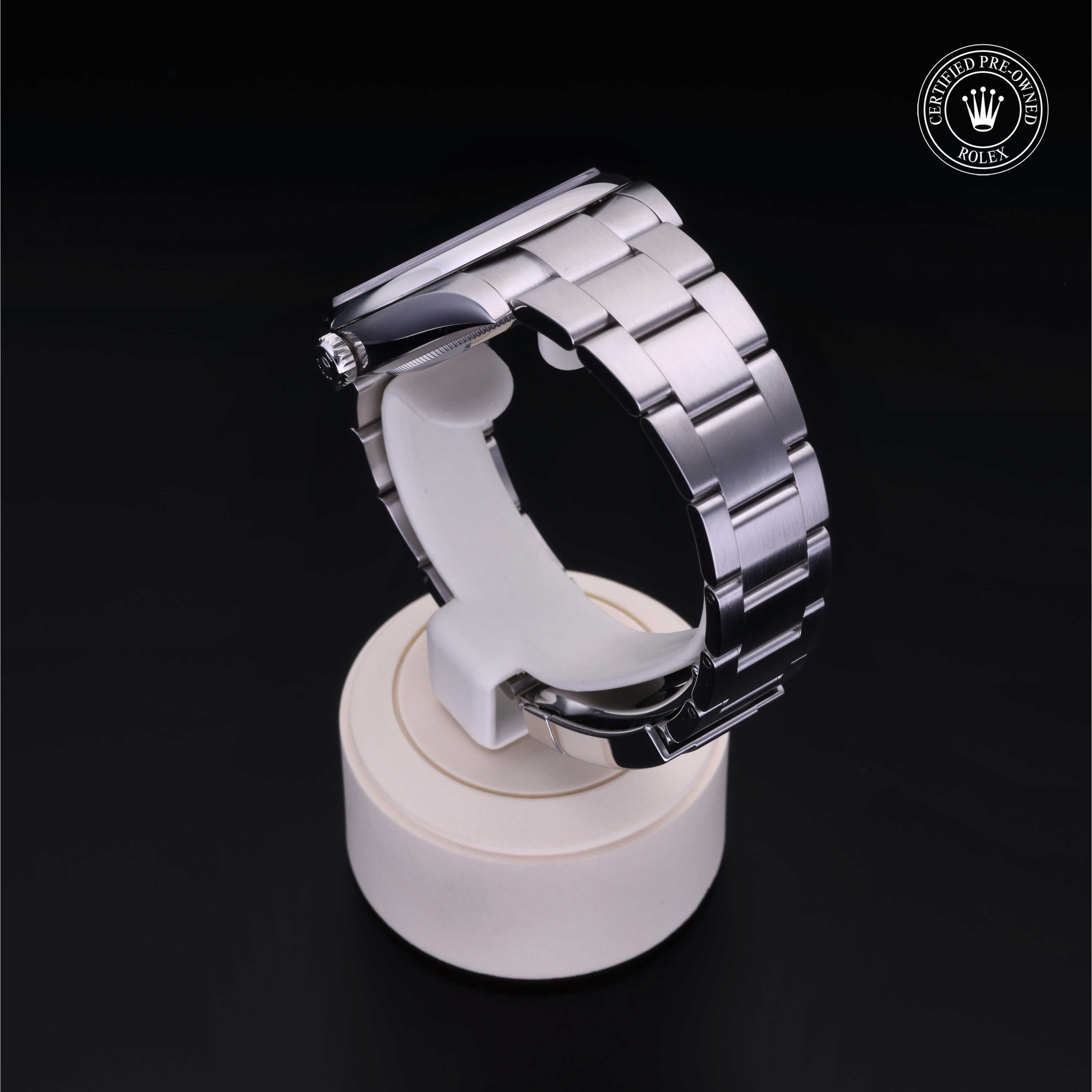 Rolex Certified Pre-owned Oyster Perpetual M124300-0005 front on black background