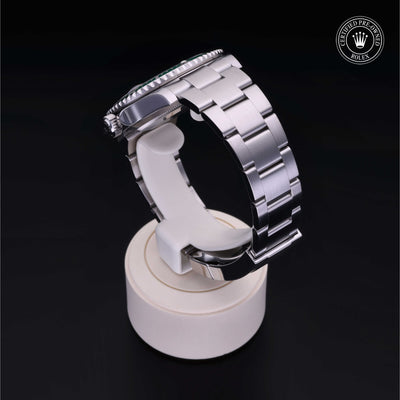 Rolex Certified Pre-owned Submariner M126610LV-0002 front on black background