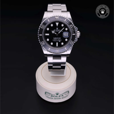 Rolex Certified Pre-owned Submariner M126610LN-0001 front on black background