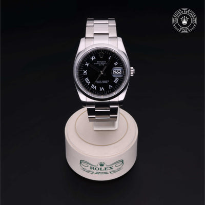 Rolex Certified Pre-owned Date M115200-0002 front on black background