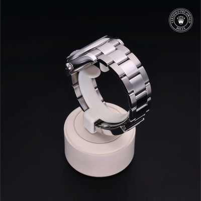 Rolex Certified Pre-owned Date M115200-0002 front on black background